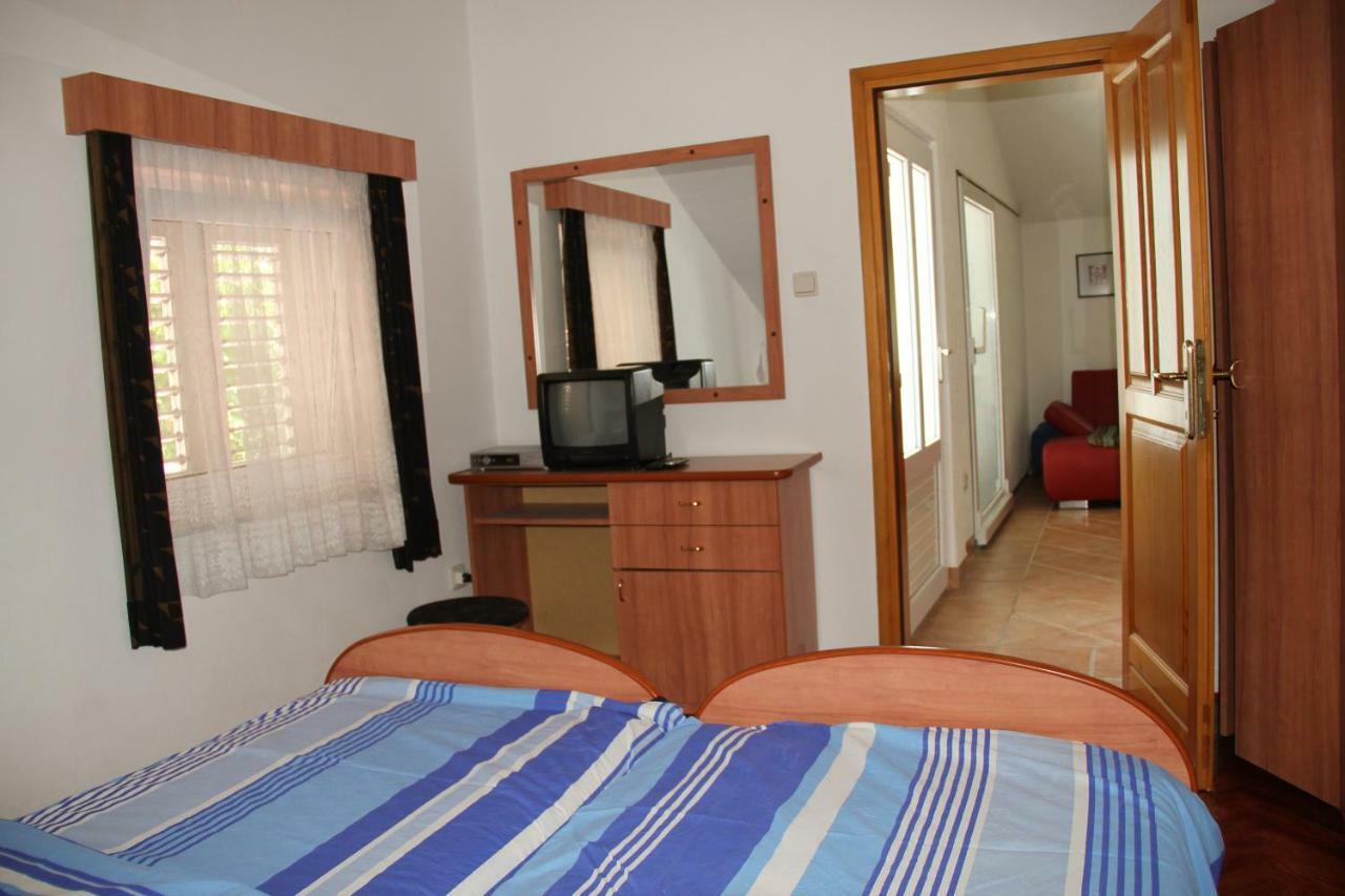 Apartmani Rasan Малинска Экстерьер фото